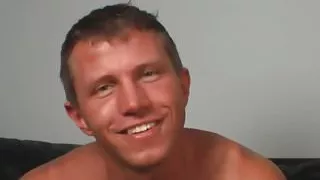 a black and a white guy making love