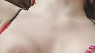 Redhead babe on the stairs rubs her pussy