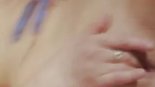 Happy chick pleases herself with a toy