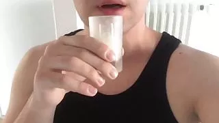 Drinking a cup of cum