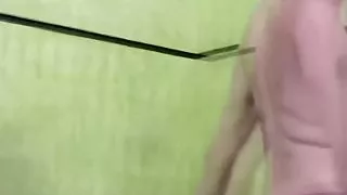 Skinny shemale strips off her bikini and reveals massive ass