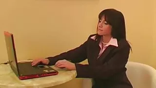 Brunette babe strips while on the phone