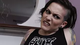 Tattooed punk babe rides on a huge cock