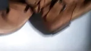 pissing in brown leather boots