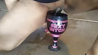 Pissing in her Sexy Bitch Cup