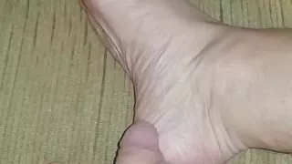 Playing with my feet and cock