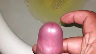 Pissing and a little of white juice