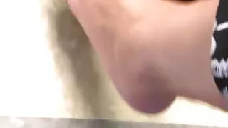 Gina teasing with her sexy feet.