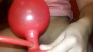 Streching session with huge inflatable plug