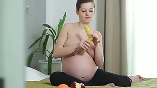 Pregnant, Stripping and Masturbating with a Banana!