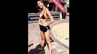 Alexis Ren outdoors in sexy shorts and top