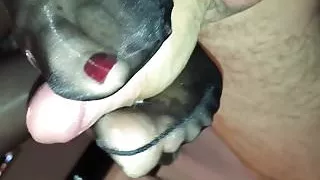 Sexy glossy pantyhose feet give hot footjob