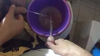 Pissing in a bucket together with my best friend
