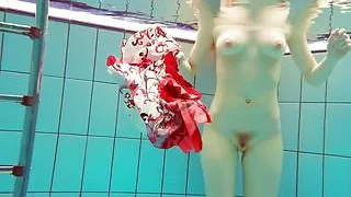 Hot Polish redhead swimming in the pool