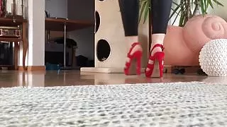 Walk in red strappy heels