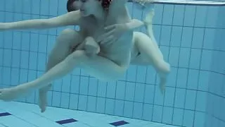 Two hot hairy beauties underwater