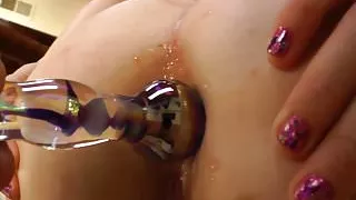Buttplug loving beauty rubs her wet cunt