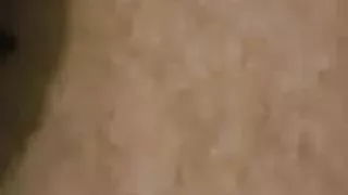 Slipping on her black high heels