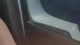 Wife masturbates in the car on the open road. NIP