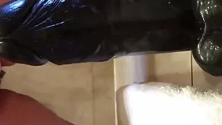 Wife rides a big black toy