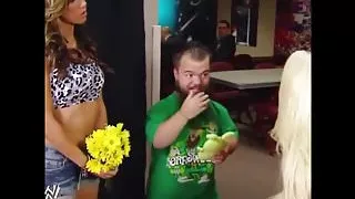 The Bitch AJ Lee kisses Hornswoggle.