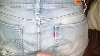 Cumming on her loose Levis