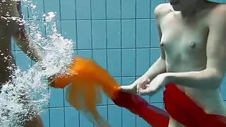 Two redheads swimming SUPER HOT!!!