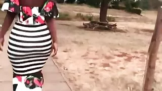 Big ass in tight long dress