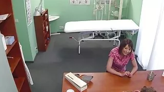 Lesbian nurse examines patients pussy