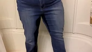Wet jeans in the shower for Ade
