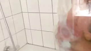 cumshot against glas in hotel bathroom, not shaved