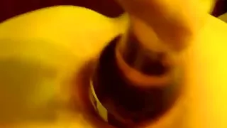 sticking a beer bottle in the ass