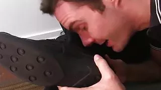 Nasty jock masturbating while licking feet of his lover boy