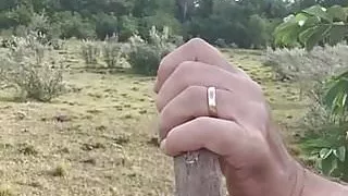 heavy riding crop on jeans and bare outdoor