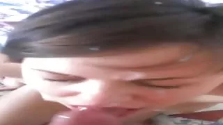 Horny girl gets a load on her face