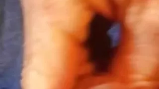 blowing a quick load close up