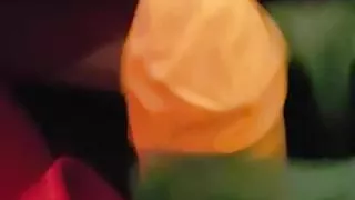 Masturbating with rubber gloves wearing a red rubber catsuit