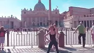 Alison Brie dancing in front of the Vatican