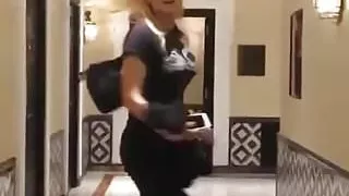 Sophie Turner in a hallway
