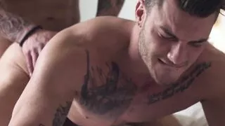 Handsome inked hunk gets his ass stuffed with raw cock