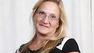 American milf Mary Wana strips off and plays at the office