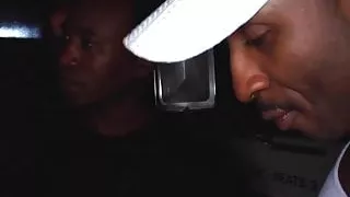 Busty MILF spitroasted by black hunks in the back of a truck