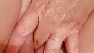 Fingering her horny pussy