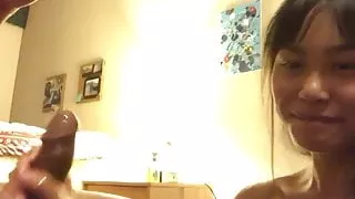 Asian girl gives wet sensual handjob