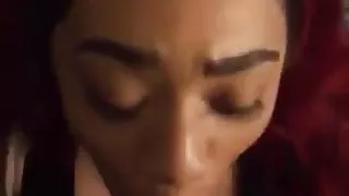 Ebony sucking cock
