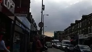 Jamaican girl in white shorts with her boyfriend