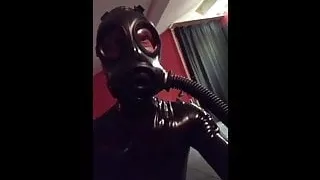 Black shiny rubber and a bit of breathplay