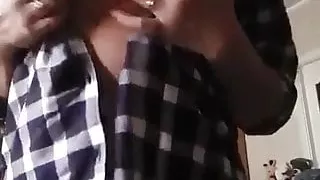 mature woman striptease at the camera