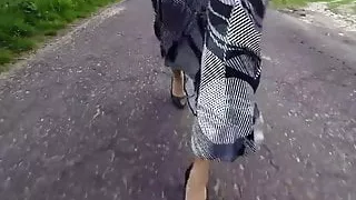 PoV walking in a long satin skirt
