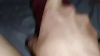 Red dildo makes her cum